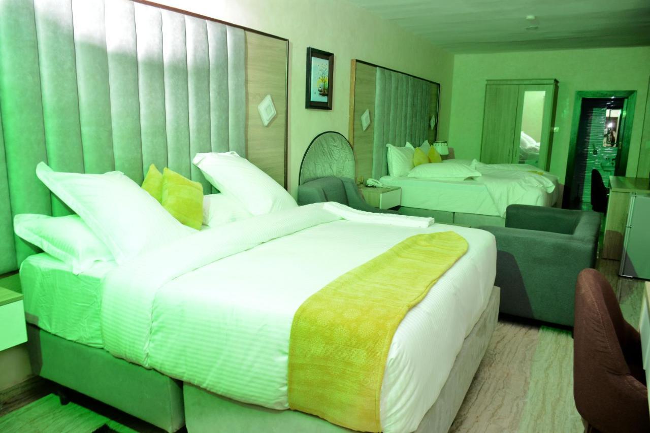 Vacation Villa Hotels And Suites Асаба Экстерьер фото