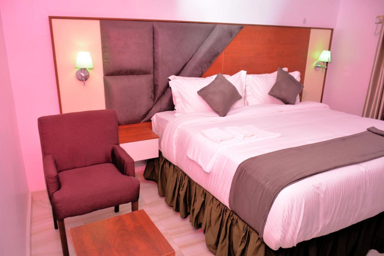 Vacation Villa Hotels And Suites Асаба Экстерьер фото
